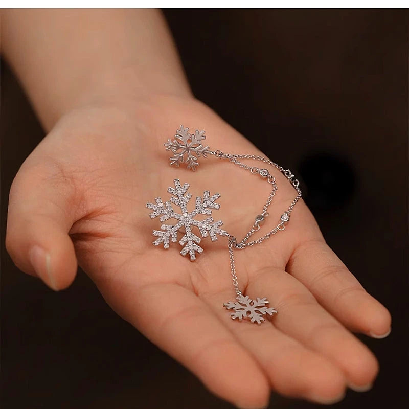 Close-up detail of the sparkling zircons and plating on the Snowflake Ear Clip