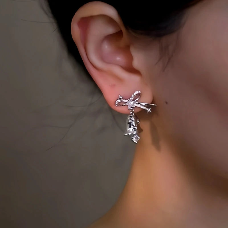 Close-up detail of the sparkling zircons and plating on the Asymmetrical Earrings