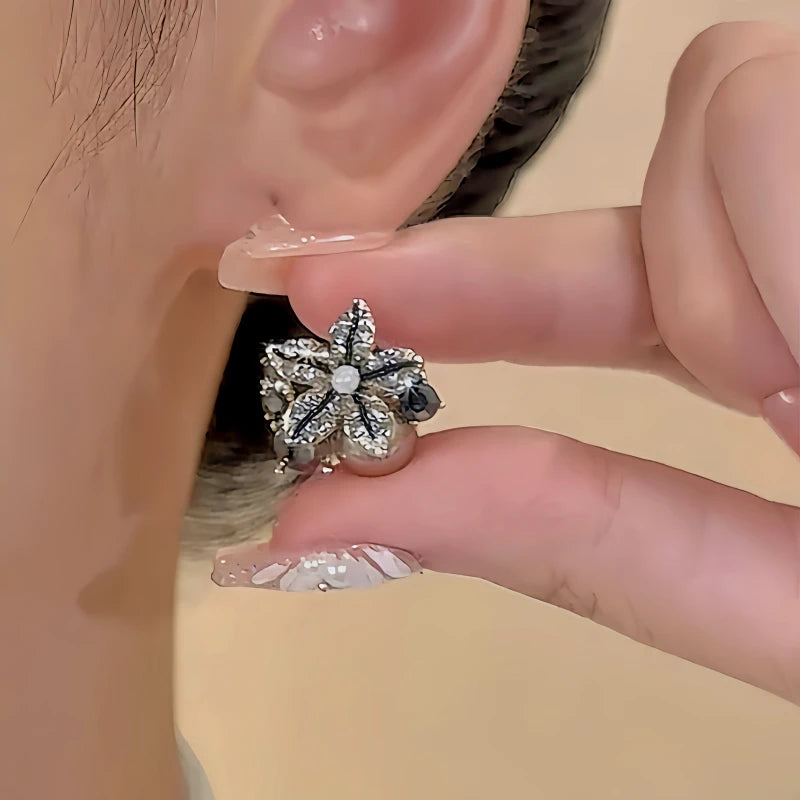 Close-up detail of the sparkling zircons and plating on the Starfish Stud Earrings