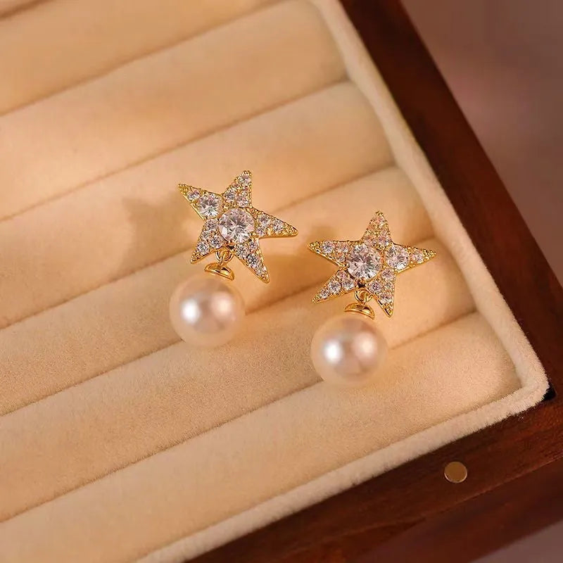 Close-up detail of the sparkling zircons and plating on the Pearl Earrings