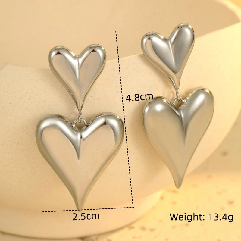 Angled view of the 18K Gold-Plated Double-Heart Earrings