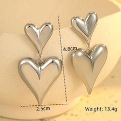 Angled view of the 18K Gold-Plated Double-Heart Earrings