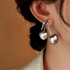 Angled view of the 18K Gold-Plated Elegant Cherry Earrings