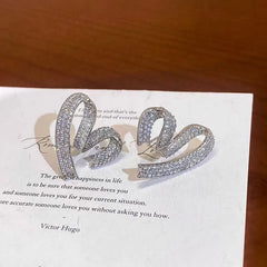 Close-up detail of the sparkling zircons and plating on the Heart Studs