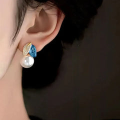 Close-up detail of the sparkling zircons and plating on the Flower Earrings