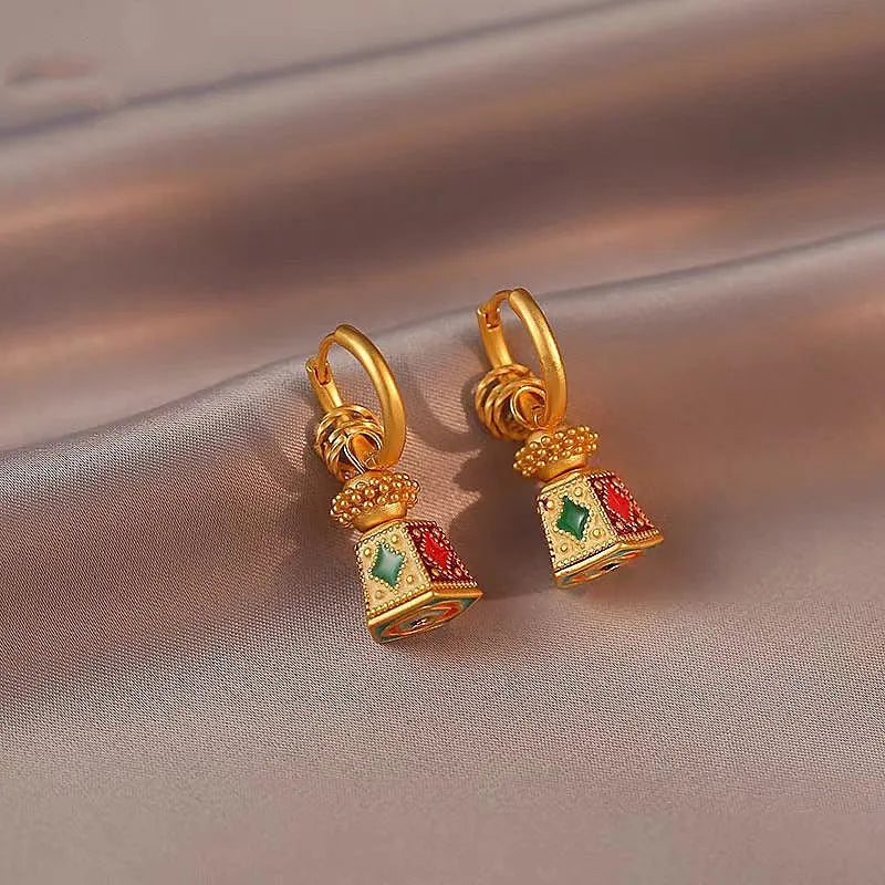 Close-up detail of the sparkling zircons and plating on the Bell-Shaped Earrings