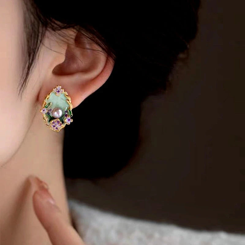Model showcasing the dangle and style of the 18K Gold-Plated Garden Pearl Earrings