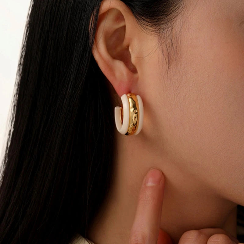 Model showcasing the dangle and style of the 18K Gold-Plated Glaze Texture C-Shaped Earrings
