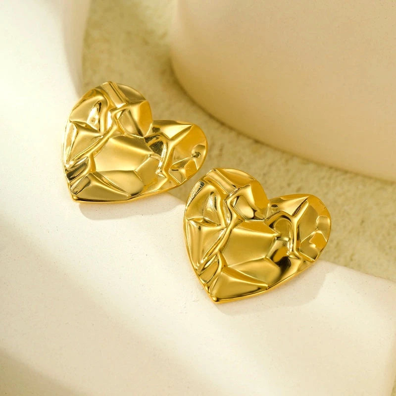 Angled view of the 18K Gold-Plated Heart-Design Earrings