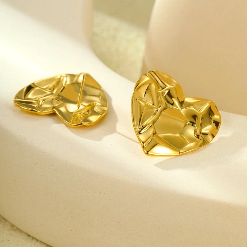 Close-up detail of the sparkling zircons and plating on the Heart-Design Earrings