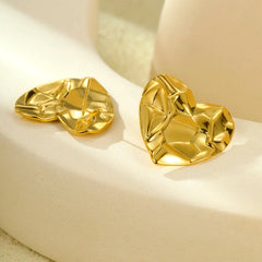 Close-up detail of the sparkling zircons and plating on the Heart-Design Earrings