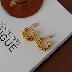 Close-up detail of the sparkling zircons and plating on the C-Shaped Earrings