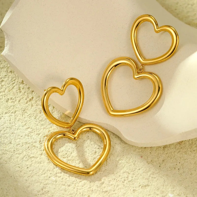 Angled view of the 18K Gold-Plated Hollow Double-Heart Earrings