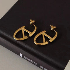 Angled view of the 18K Gold-Plated Letter V Earrings