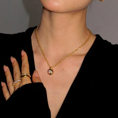 Detailed view of the 18K Gold-Plated Round Smooth Zircon Necklace chain and pendant