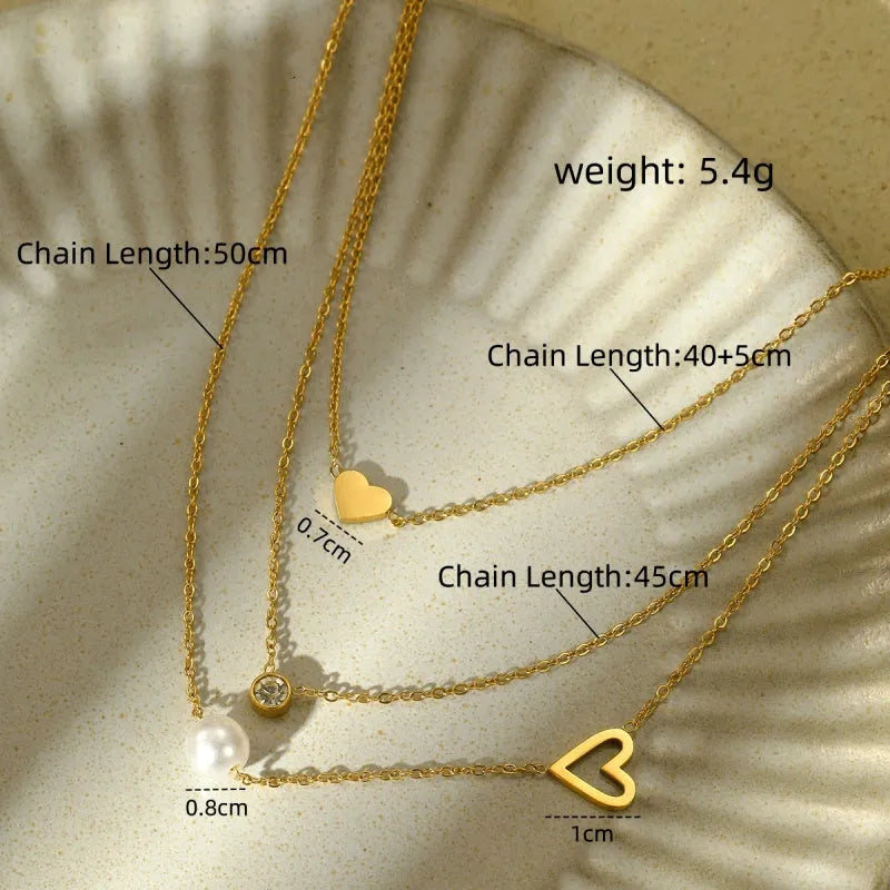 18K Gold-Plated Three-Layer Zircon Heart Pearl Necklaces worn to showcase its length and pendant detail