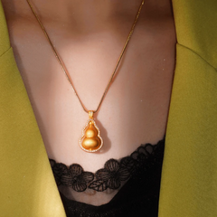 Close-up of the pendant and clasp on the Gourd Necklace