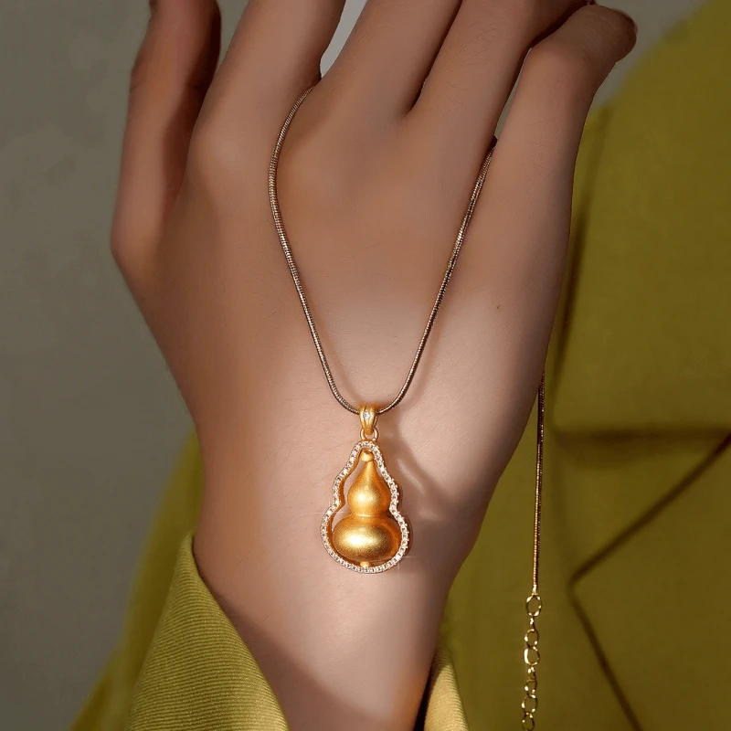 18K Gold-Plated Zircon Auspicious Gourd Necklace worn to showcase its length and pendant detail