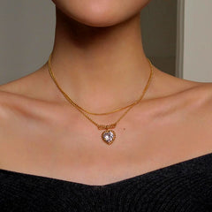 Close-up of the pendant and clasp on the Bow Necklace