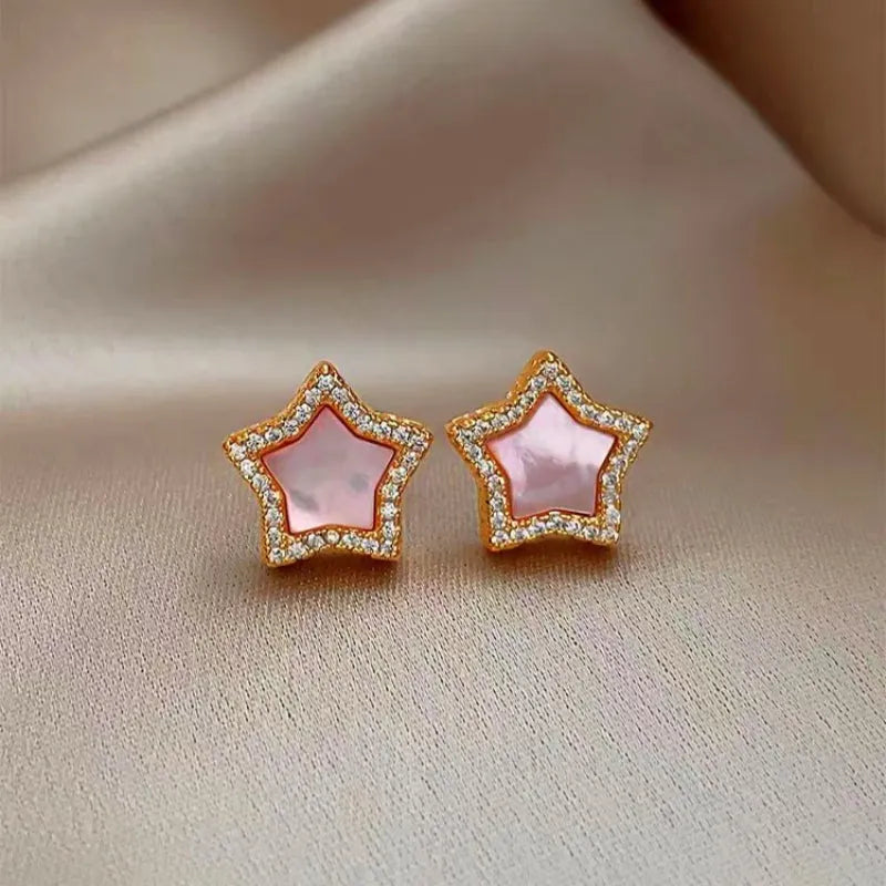 Gold Pink Mother of Pearl Star Stud Earrings Pair, Front View on Satin