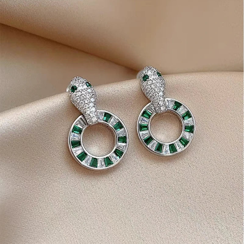 Silver Snake Drop Earrings with Green and Clear Baguette Stones