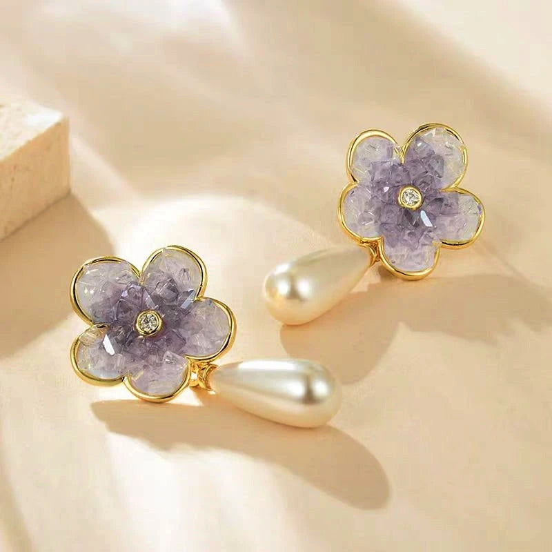 Close-up detail of the sparkling zircons and plating on the Pearl Earrings