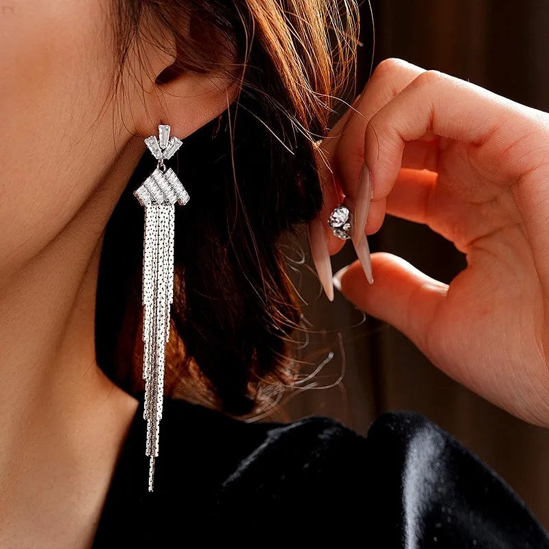 Close-up detail of the sparkling zircons and plating on the Tassel Earrings