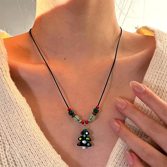 Christmas Gingerbread Man Christmas Tree Socks Leather Rope Sweater Necklace worn to showcase its length and pendant detail