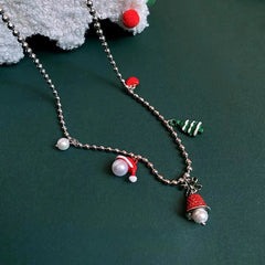 Christmas Series Christmas Tree Santa Claus and Bell Necklace worn to showcase its length and pendant detail