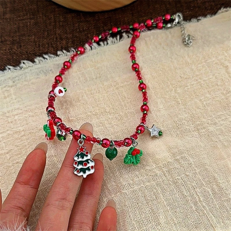 Detailed view of the Christmas Tree Red Beaded Small Accessory Necklace chain and pendant