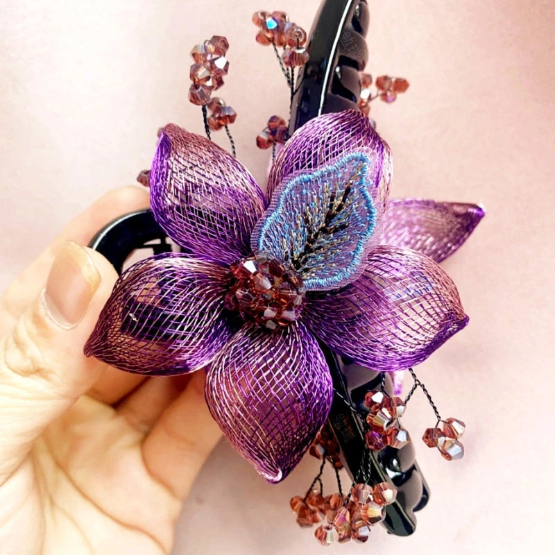 Angled view of the stylish Copper Wire Double-Sided Flower Hair Clips