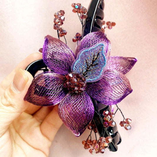 Angled view of the stylish Copper Wire Double-Sided Flower Hair Clips