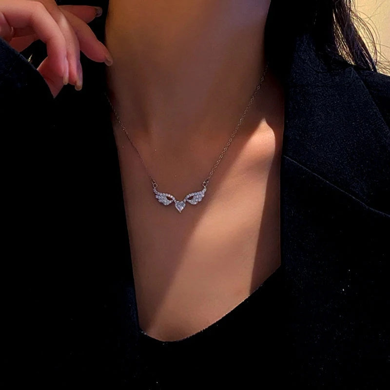 Close-up of the pendant and clasp on the Angel Wing Necklace