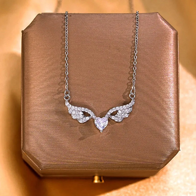 Detailed view of the Diamond Heart Angel Wing Necklace chain and pendant