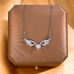 Detailed view of the Diamond Heart Angel Wing Necklace chain and pendant