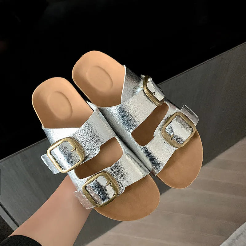 Close-up showing the material and craftsmanship of the Double Buckle Slippers