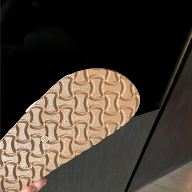 Double Buckle Thick Bottom Heightening Birkenstock Slippers shown for scale and size reference