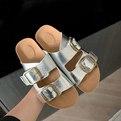 Close-up showing the material and craftsmanship of the Double Buckle Slippers