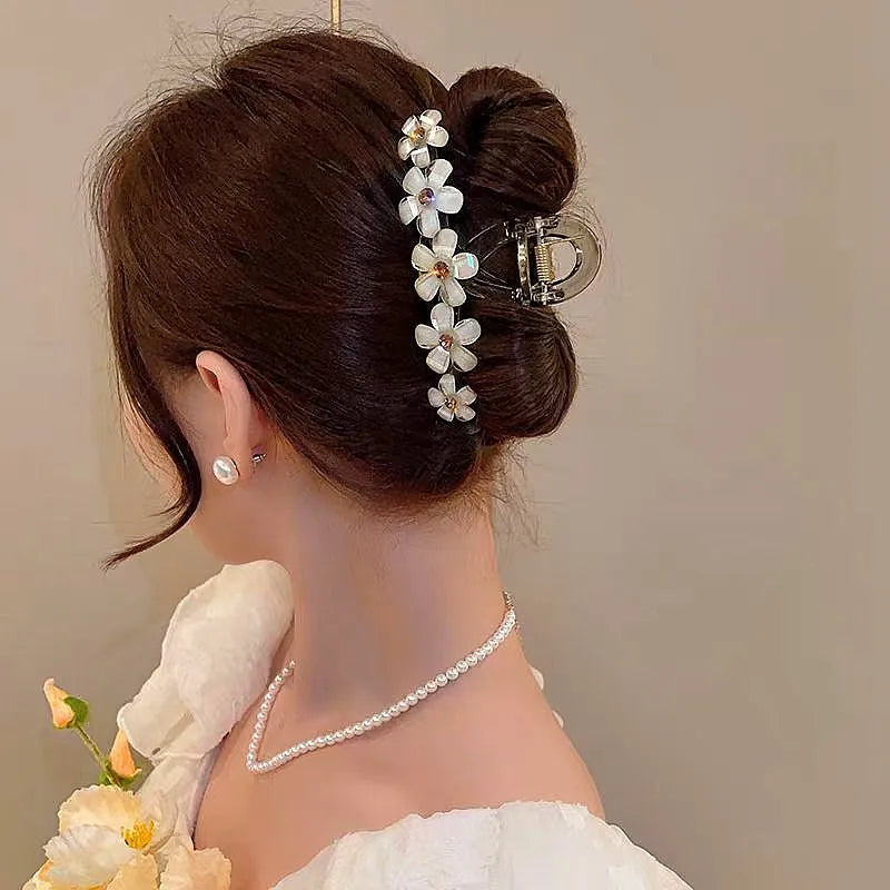 Close-up showing the material and craftsmanship of the Flower Hair Clip