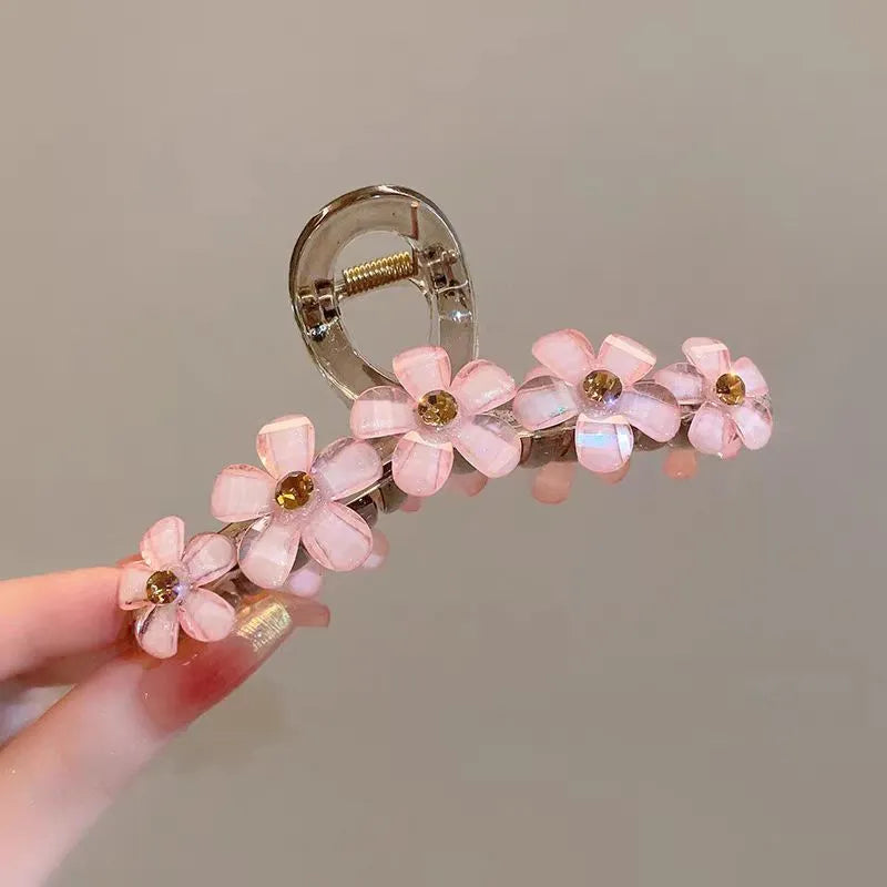 Elegant Acrylic Flower Hair Clip shown for scale and size reference