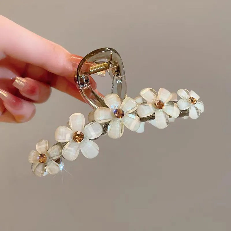 The versatile Elegant Acrylic Flower Hair Clip, perfect for daily use or special occasions