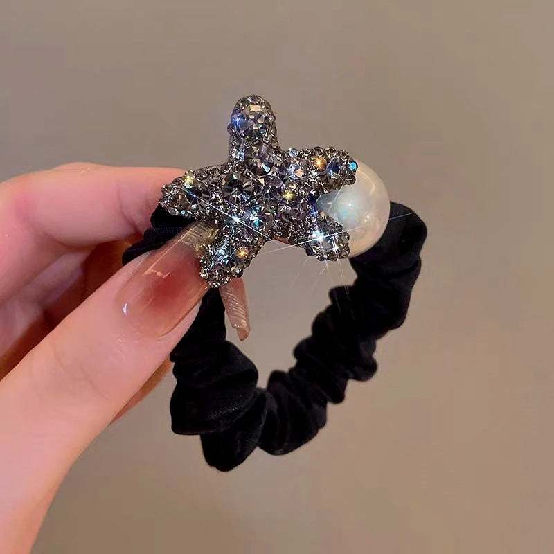 The versatile Elegant Rhinestone Star And Pearl Hairband, perfect for daily use or special occasions