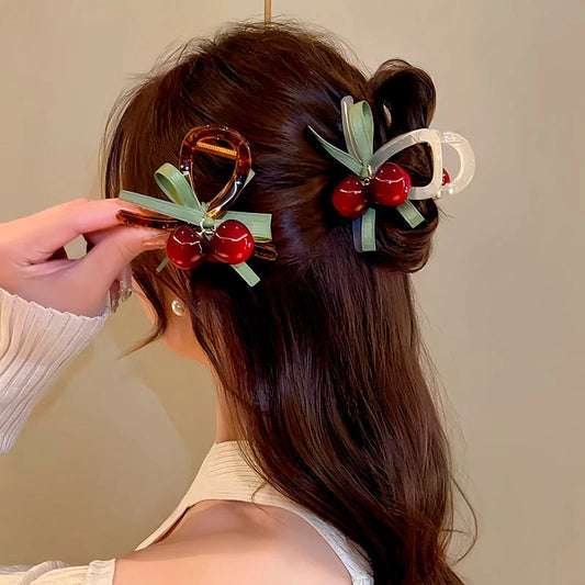 Angled view of the stylish Elegant Cherry Hair Clip