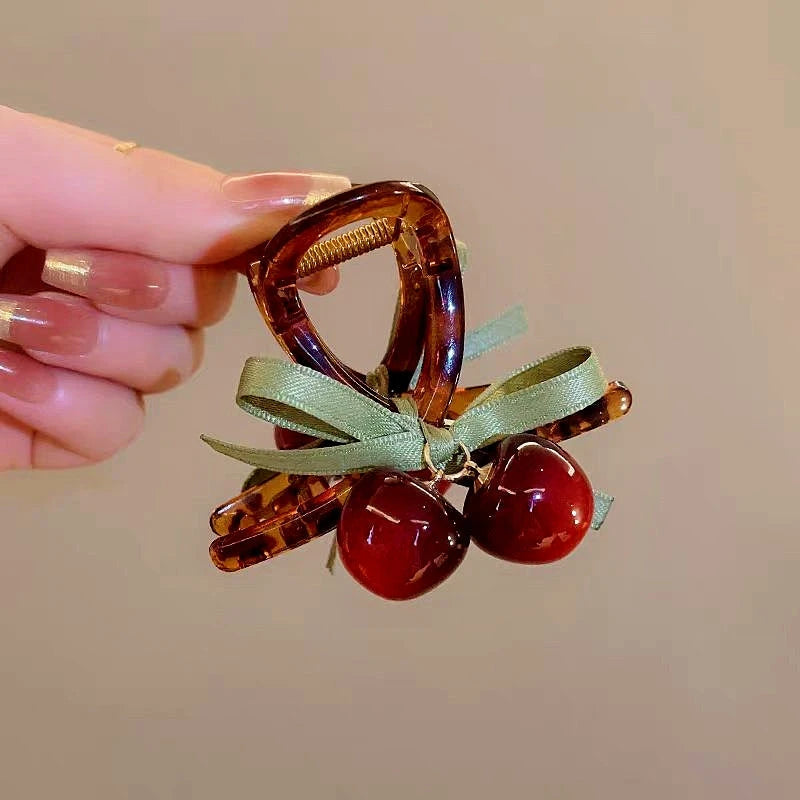 Elegant Cherry Hair Clip shown for scale and size reference