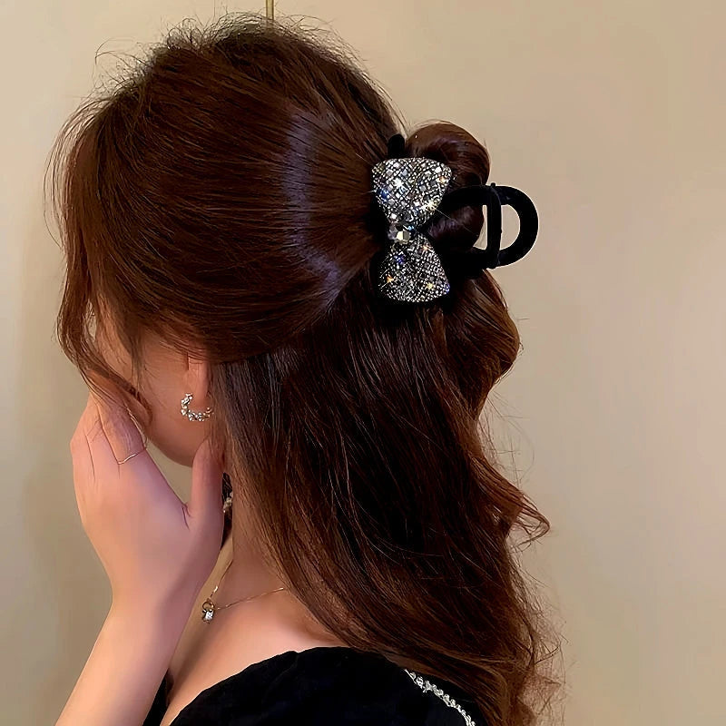 Angled view of the stylish Elegant Diamond Bow Hair Clip