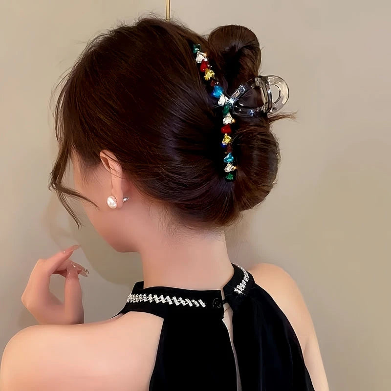 Angled view of the stylish Elegant Dopamine Colored Love Acrylic Hair Clip
