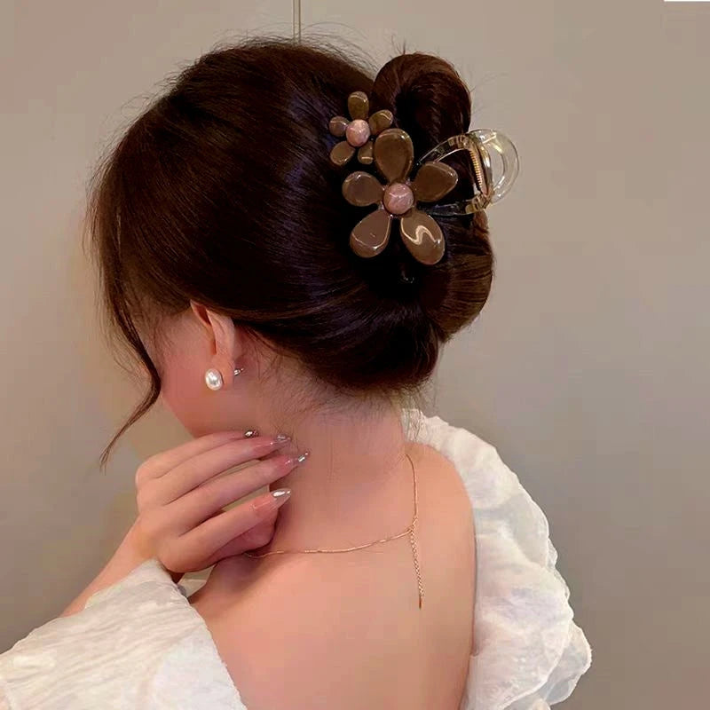 Close-up showing the material and craftsmanship of the Flower Hair Clips