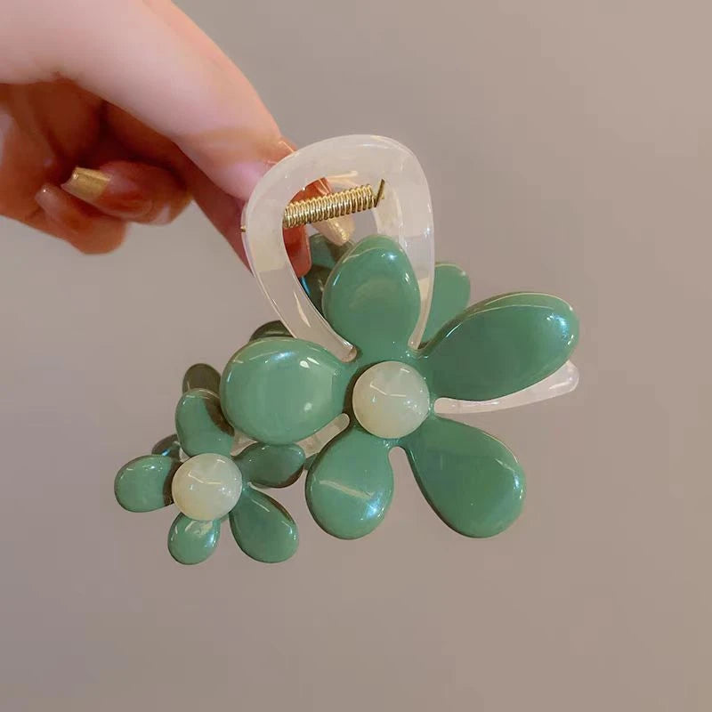 Elegant Fairy Flower Hair Clips shown for scale and size reference