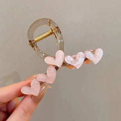 Angled view of the stylish Elegant Heart Hair Clips