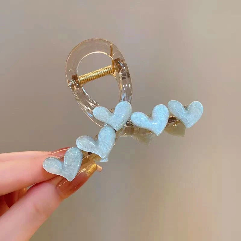 Close-up showing the material and craftsmanship of the Heart Hair Clips